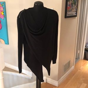 Black overlap sweater.